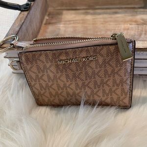 MK rose gold card holder.